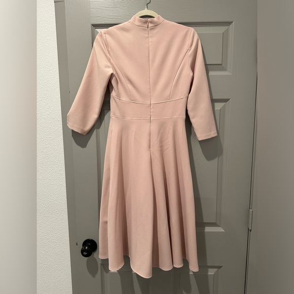 Vince Camuto dress in size 2. Super cute and snatched on the waist. - Picture 3 of 4